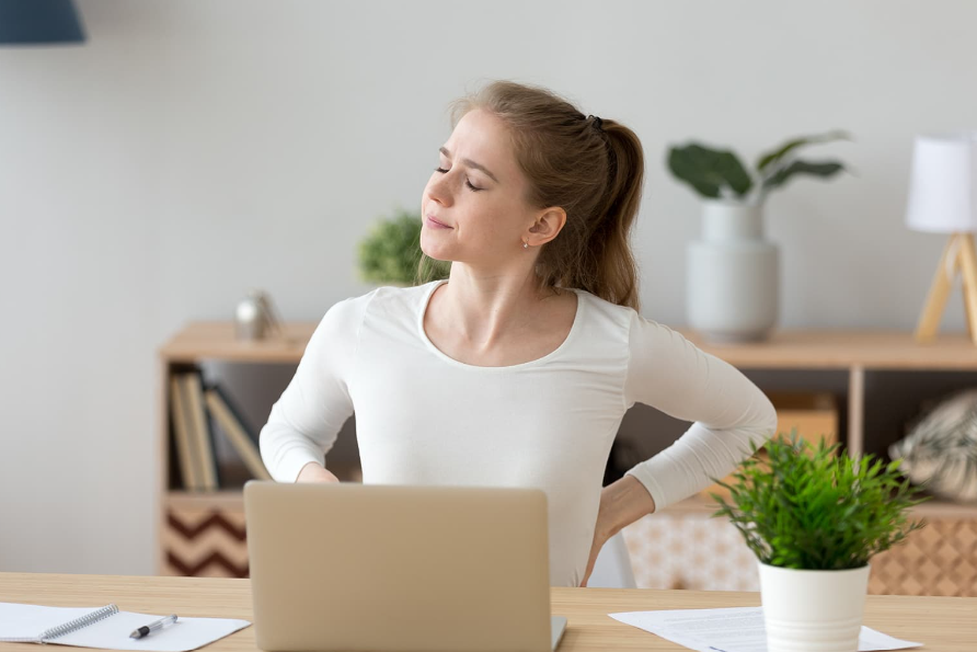 Woman Sitting At Desk